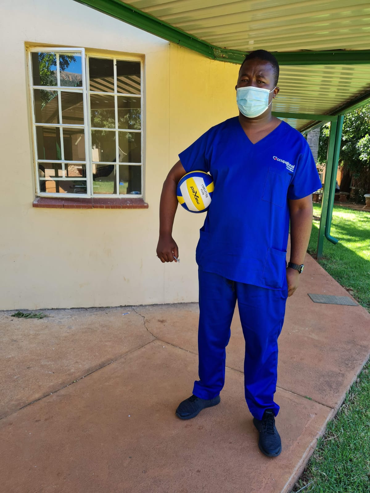 Occupational therapist assisting a patient